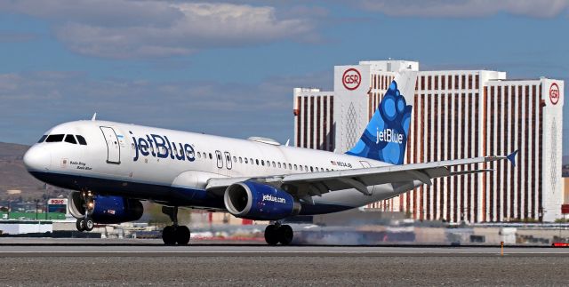 Airbus A320 (N534JB) - "Bada Bing, Bada Blue," jetBlue's N534JB, as the mains kiss the concrete of 16L to complete a flight from KLAX.