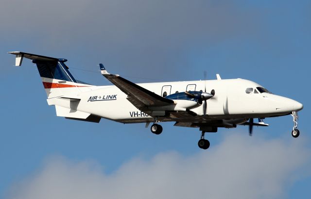 Beechcraft 1900 (VH-RUE) - Short Final To Rwy 16R