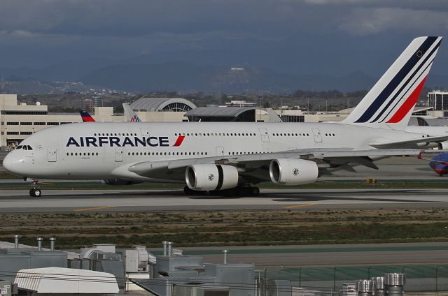 Airbus A380-800 (F-HPJC) - Taxiing after landing at the LAX. Hollywood sign is visible in the background.