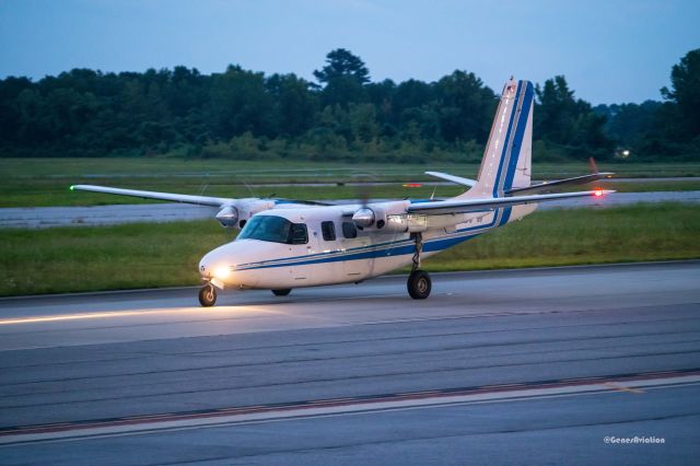 Aero Commander 500 (N118PW) - Rockwell Commander just arrived in the evening.  Viewed from the observation stand. 