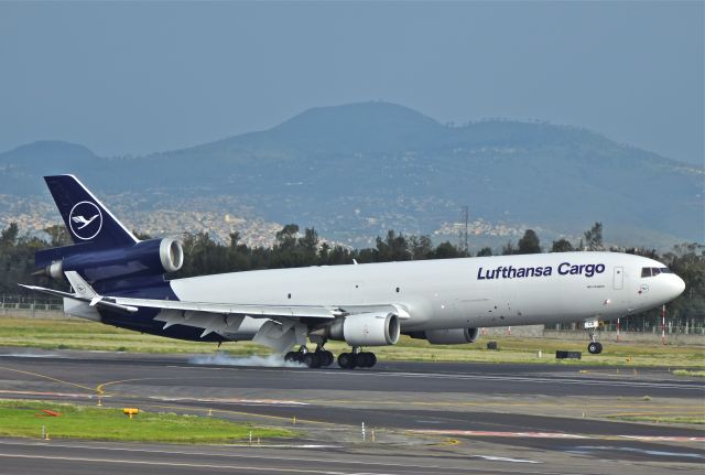 Boeing MD-11 — - Lufthansa Cargo MD-11, with new livery is landing on runway 23L in Mexico City Airport (AICM).