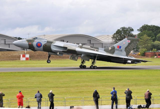 XH558 — - The most photographed Vulcan bomber. Unfortunately she will no longer fly after 2013 due to extensive maintenance required and shortage of funding. Landing after flying display at 2012 Farnborough International Air Show.