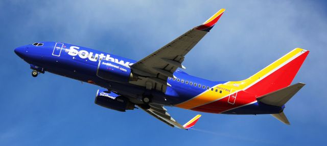 Boeing 737-700 (N497WN) - Departing runway 25 on April 3, 2017 for Burbank.