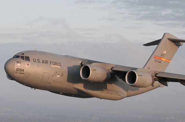 Boeing Globemaster III — - Air Force cargo Heritage flight practice over Houston, TX. Shot from AC-47 "Spooky" Gunship