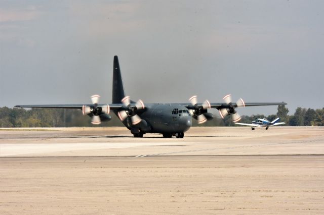 — — - CC130 Hercules photographed at SAREX last summer.