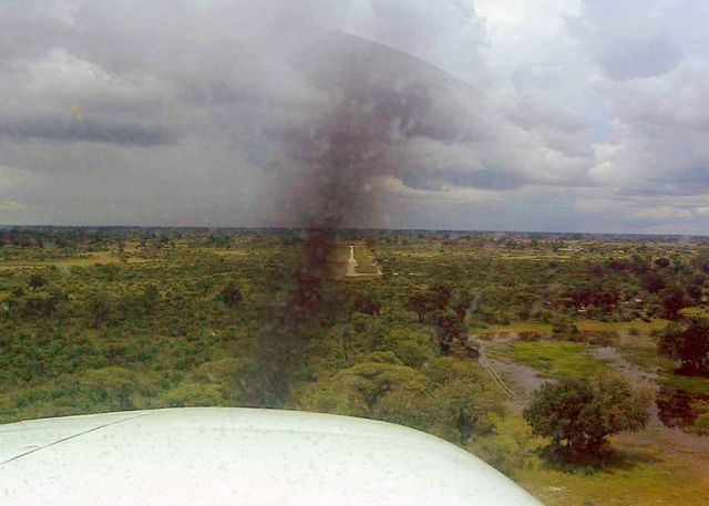 Cessna Centurion (ZS-AVB) - Short final at the old Vumbura strip.