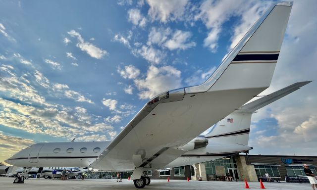 Gulfstream Aerospace Gulfstream IV (N17KW) - Under-wing shot of N17KW, a 1999 Gulfstream G-IV(SP), during EAA AirVenture ‘22. 7/27/22. 