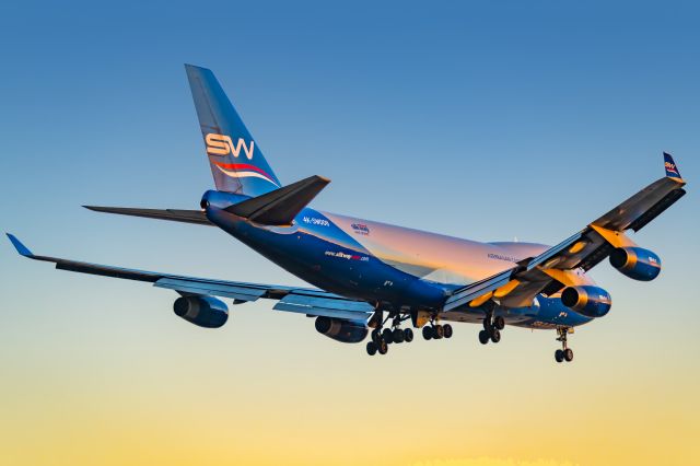 Boeing 747-400 (4K-SW008) - Silkway West B744 arriving DFW at sunset