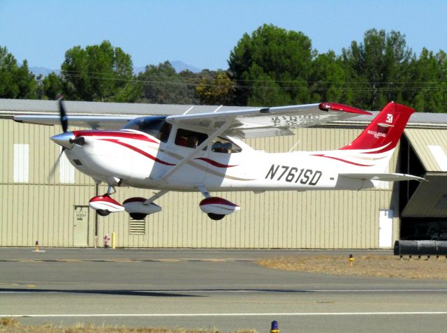 Cessna Skylane (N761SD) - Taking off RWY 24