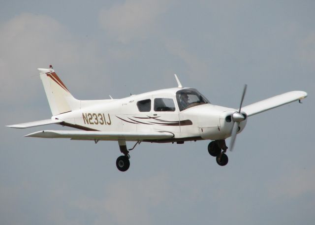 Beechcraft Sundowner (N2331J) - Landing on 14 at Downtown Shreveport.