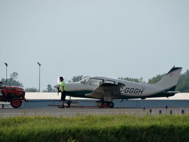 Piper Cherokee (C-GGGH) - while taxiing the archer got a flat tire and had to be towed back to the maintenance hangar, departed about 2 hours later