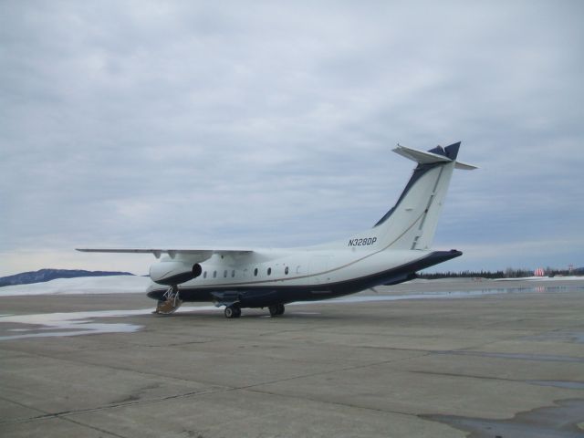 Piper Navajo (N328DP) - Parked at Irving Aviation FBO,Goose Airport NL. April 25/09