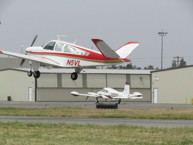 Beechcraft 35 Bonanza (N5VL) - Taking off RWY 24