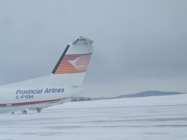 de Havilland Dash 8-100 (C-FYDH) - Parked at terminal Goose Airport NL, April 15/09