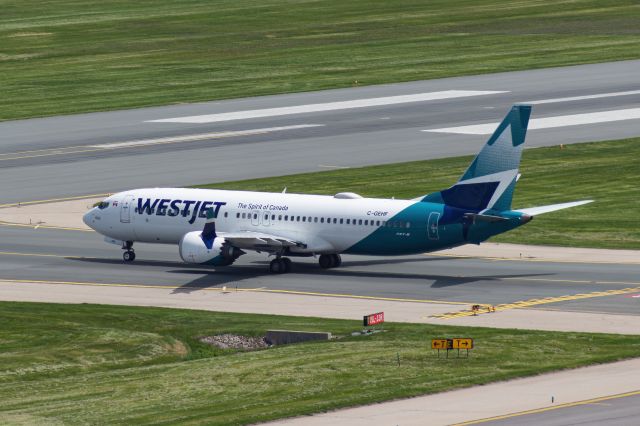 Boeing 737 MAX 8 (C-GEHF) - Crossing runway 15 left at intersection tango.