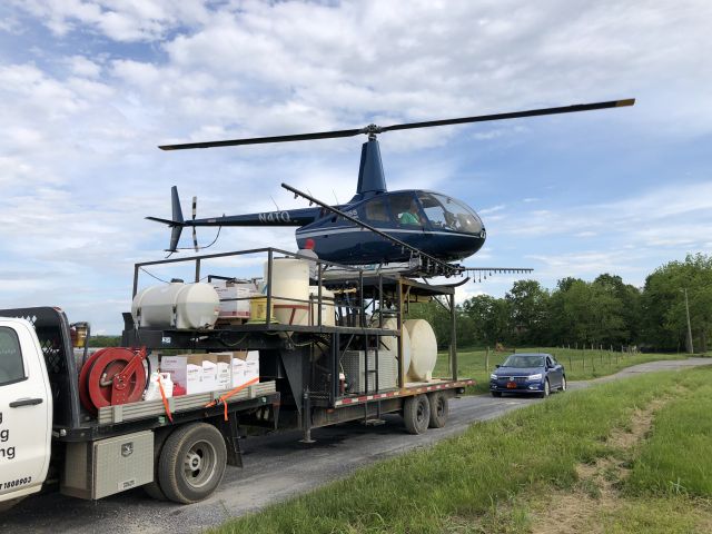 Robinson R-66 (N4TQ) - Knitter CropDusting is back for more fuel and spray before heading for more dusting. Location is Kidwiler Road near Uvilla, WV