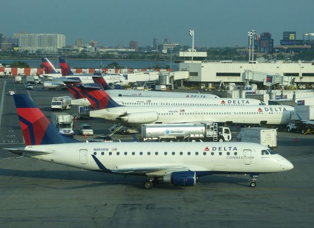 Embraer 170/175 (N860RW) - Shuttle America E-170 N860RW arrives from RSW and taxis to the Gate at Deltas new operation at Terminal C at KLGA.