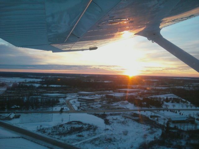 Cessna Skyhawk (N51248) - AFter takeoff from runway 31 at KOZW