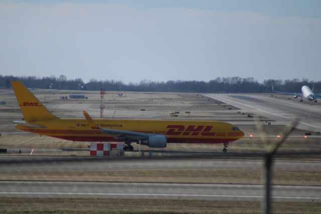 BOEING 767-300 (G-DHLE) - Number 1 Best Workplace livery, with a prime air 767 departing on runway 27.