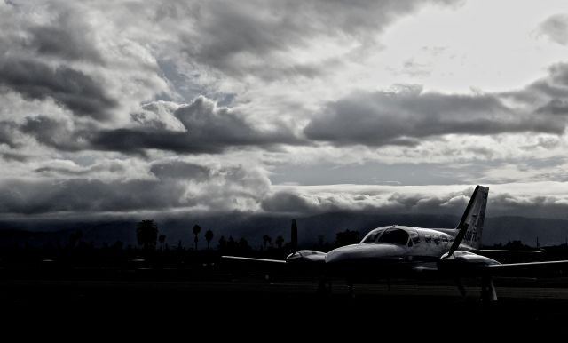 Cessna 421 (N6867L) - Gloomy skies at Reid Hillview Airport.