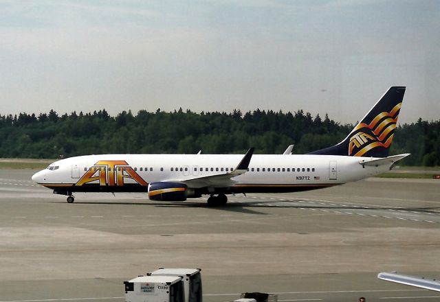 Boeing 737-800 (N317TZ) - KSEA - ATA arriving at Seattle from Indianapolis