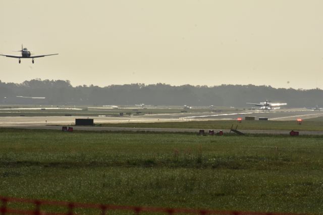 North American T-6 Texan — - T-6 Texans landing early in the morning at SNF18