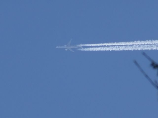 BOEING 777-200LR (B-16722) - EVA Air hello kitty livery over Fargo 