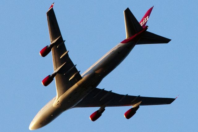 Boeing 747-400 (G-VHOT) - 12/23/12:  Virgin flight 5 on a downwind leg over Miami Lakes at sunset enroute to MIA on a nonstop flight from London Heathrow.