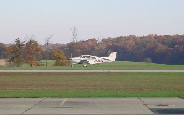 Beechcraft Bonanza (33) (N8465N) - Landing rwy 27 on 10/29/09