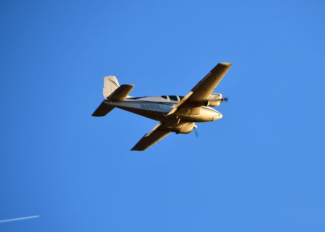 Beechcraft Travel Air (N95DL) - Beech B95 N95DL leaving Ann Arbor 