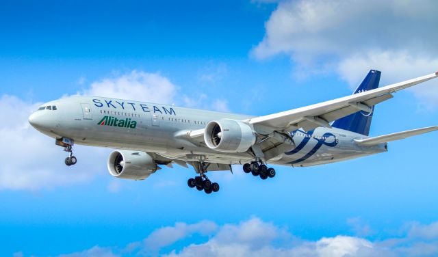 Boeing 777-200 (EI-DDH) - About to cross Airport Rd, taken from the lawn of the TD Bank
