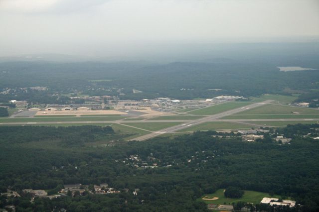 Fairchild Dornier SA-227DC Metro (N54GP) - A view out the window of KBED.  Taken out of N54GP