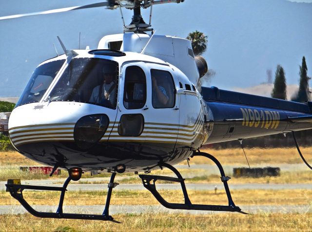 Eurocopter AS-350 AStar (N991DW) - A very nice Eurocopter AS 350 hover-taxing to transient parking at Reid Hillview.