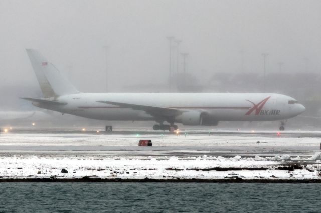 BOEING 767-300 (N219CY) - ABX B763 in white livery arrives to a snowy Boston Logan. 