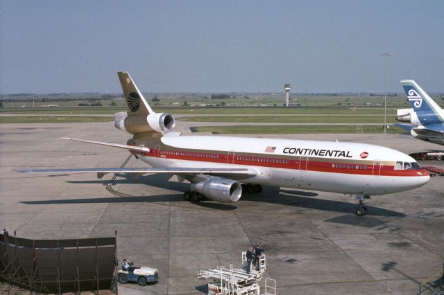 McDonnell Douglas DC-10 (N12061) - There's been some recent discussions about United's livery change and that the last vestiges of the Continental identity are being removed so I thought I'd get this out of the archives, plus it's a classic aircraft - can we call a 1960s designed tri-jet a classic now?br /br /This was taken in November 1981 when Tullamarine had an extensive open observation deck.