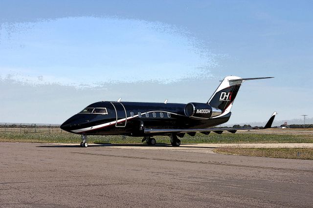 Canadair Challenger (N400DH) - NASCAR aircraft are gathering at Denton TX but occasionally one will drop in at KGVT for economical Jet-A.