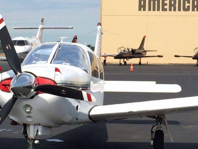 Piper Cherokee (N9099K) - Piper Arrow N9099K at Boeing Field during SeaFair with the Blue Angels and the Patriots.  Aug 1, 2014.