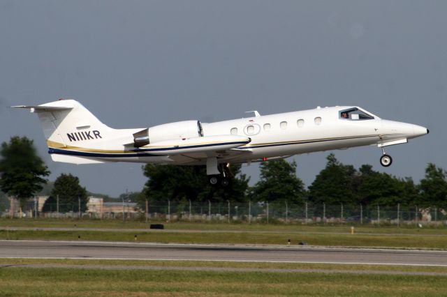 Learjet 35 (N111KR) - Airborne off rwy 14 on 17-Jul-07.