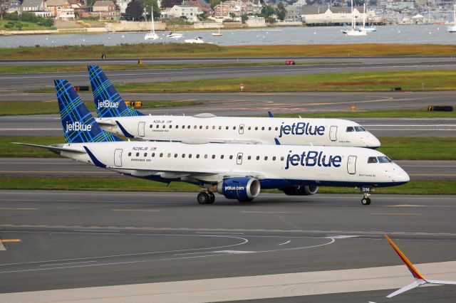 Embraer ERJ-190 — - 2 JetBlue E190s taxing parallel to each other at Boston