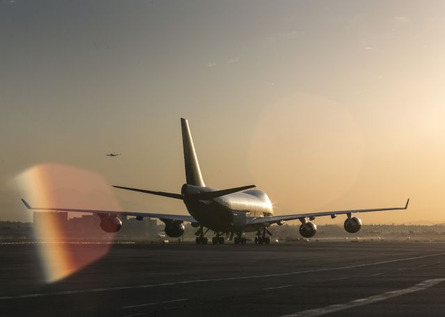 Boeing 747-400 (N415MC) - Morning taxi to freight area after landing on runway 25R LAX, Los Angeles, California USA