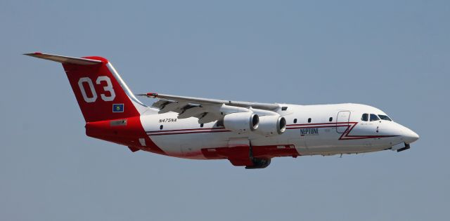 British Aerospace BAe-146-200 (N475NA) - Neptune Aviation Services's N475NA, a BAe-146, is putting the tread to bed as it climbs away from Reno Stead Airport enroute to Gowen Field (KBOI) in Boise, ID.