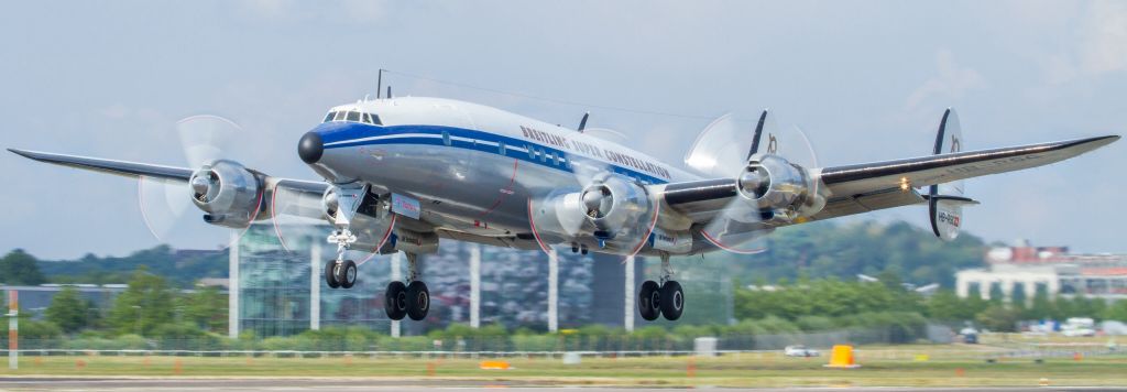 Lockheed EC-121 Constellation (HB-RSC) - The Breitling Super Constellation returns from her flight at Farnborough 2014.