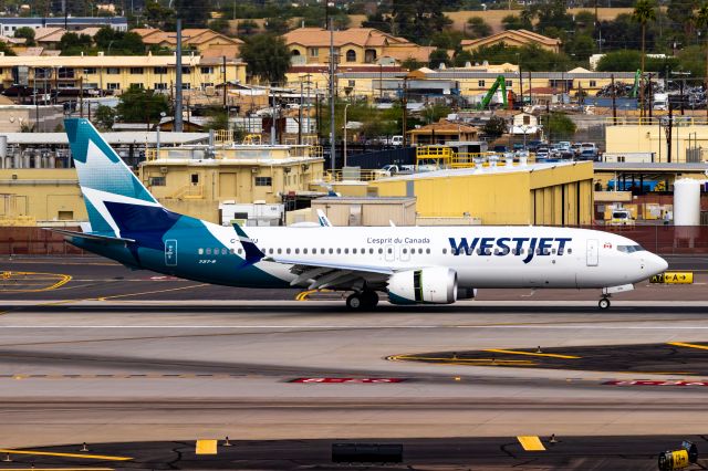 Boeing 737 MAX 8 (C-FEWJ) - WestJet 737 MAX 8 landing at PHX on 11/1/22. Taken with a Canon 850D and Tamron 70-200 G2 lens.