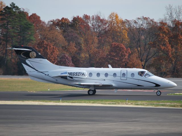 Beechcraft Beechjet (N500TH) - CAROLINA AIR TRANSFER LLC taxiing to runway 2 at KJQF - 11/14/12