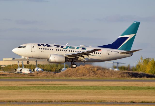 BOEING 737-600 (C-GWSJ) - The Canadian Regional F28 bone yard