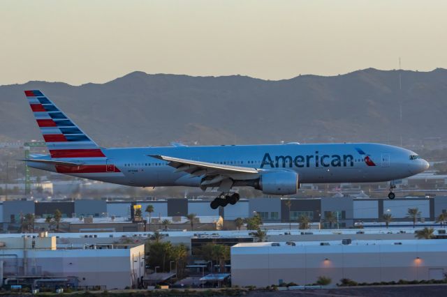 Boeing 777-200 (N779AN) - An American Airlines 777-200 landing at PHX on 2/12/23 during the Super Bowl rush. Taken with a Canon R7 and Canon EF 100-400 II L lens.