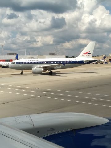 Airbus A319 (N745VJ) - I was on a departing Delta flight ATL-TUS