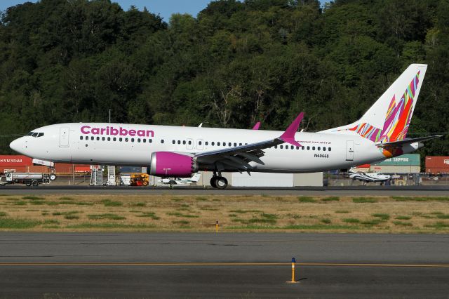 Boeing 737-700 (9Y-CAL) - 9Y-CAL carrying test reg N60668 arriving BFI after a test flight.