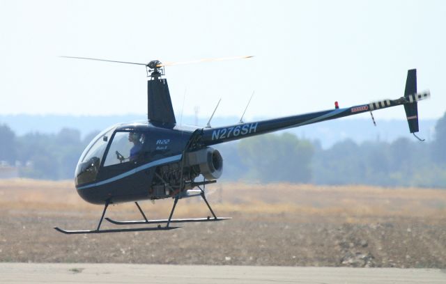 Robinson R-22 (N276SH) - KRDD - on the hover at the PHi Medical ramp at Redding CA 9-11-2014.