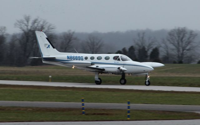 Cessna Conquest 2 (N8689G) - Departing rwy 09...